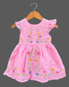 Frill sleeve organic casual frock with embroidered floral vines and casual frock styling details.