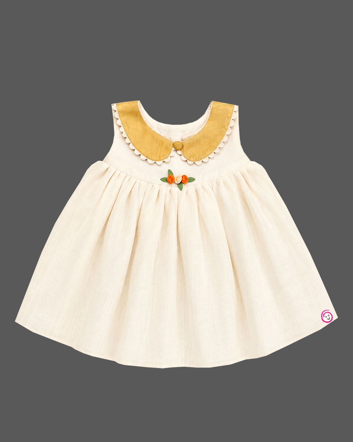 Sleeveless festive ethnic frock for toddler girls featuring a scalloped Peter Pan collar and small floral bodice detail.