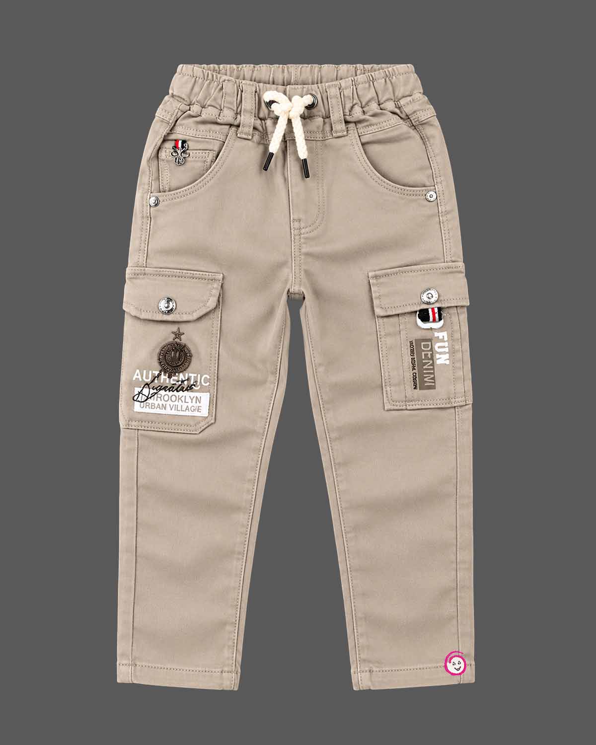 Boys button-down shirt and cargo pant set designed as party wear for boys with tropical print and chest embroidery.