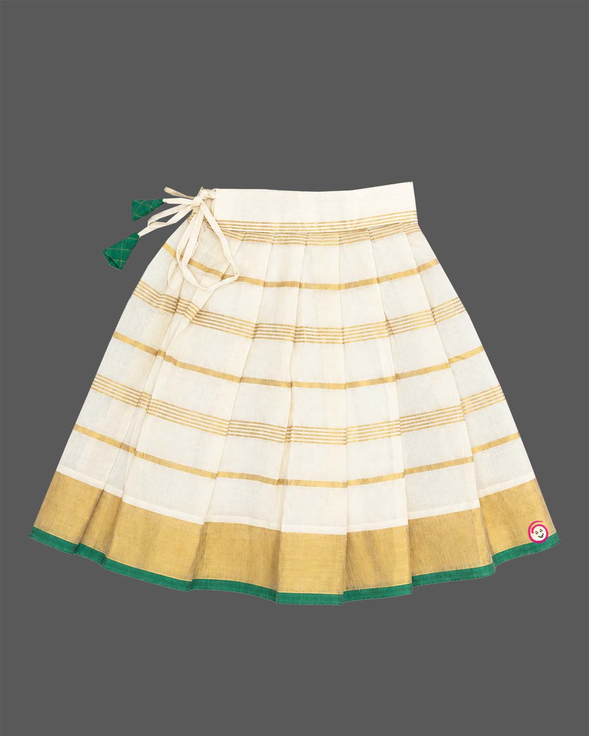 Girls traditional South Indian pattu pavadai choli set for Onam festival featuring gold zari borders