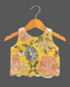Embroidered lehenga choli for kids featuring scalloped floral sequin work and drawstring tassel ties