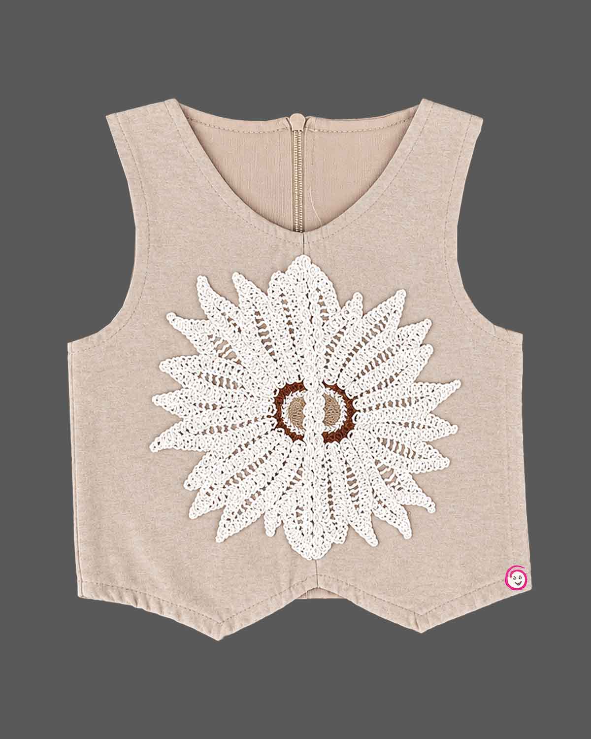 Kids party wear vest top and trouser set featuring crochet floral applique and back zipper closure.