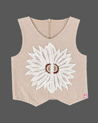 Kids party wear vest top and trouser set featuring crochet floral applique and back zipper closure.