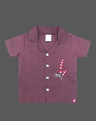 Young boy embroidered shirt and tailored shorts set featuring delicate motif details for casual wear.
