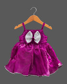 Toddler satin party frock featuring a sequined double bow and sleeveless strap design