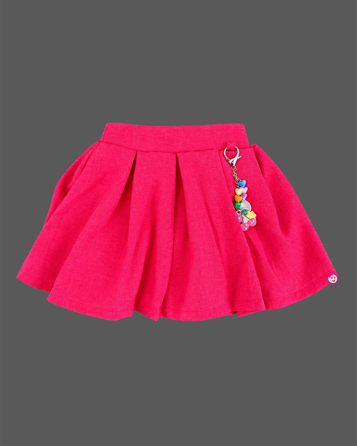 Girls sleeveless printed collar waistcoat with brooch and pleated flared skirt for kids party wear.