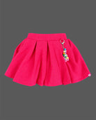 Girls sleeveless printed collar waistcoat with brooch and pleated flared skirt for kids party wear.
