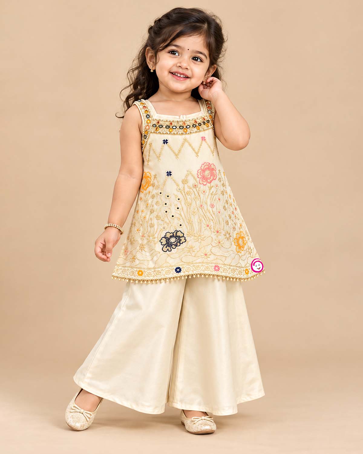 Girls Silk Sharara Set featuring floral embroidered short kurti with wide flared sharara pants for festive wear