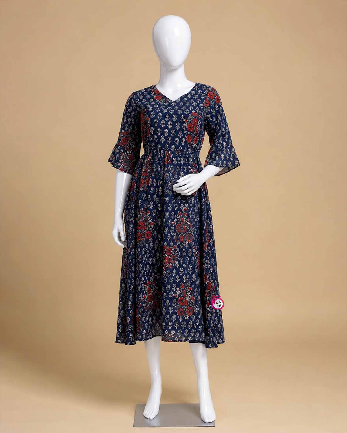 Maternity printed georgette flared dress featuring v-neckline and three-quarter bell sleeves