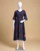 Maternity printed georgette flared dress featuring v-neckline and three-quarter bell sleeves