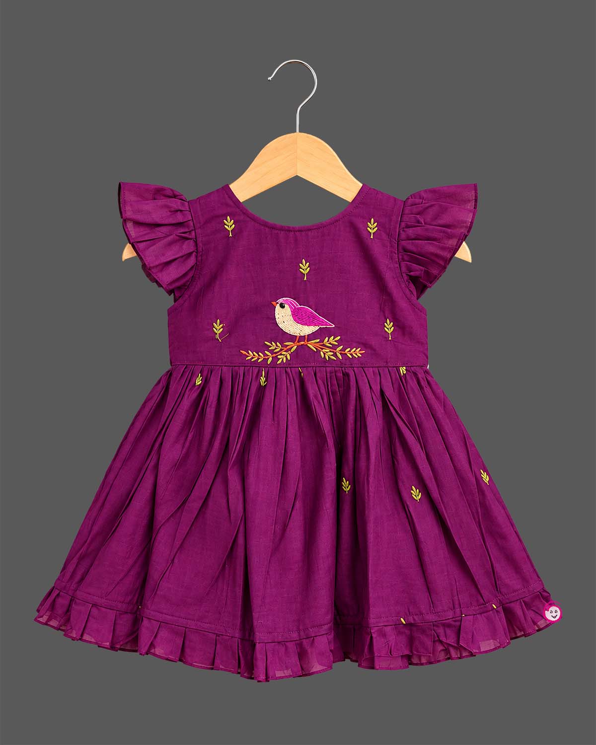 Silk frocks for baby girl with bird embroidery, frill  sleeve, and ruffled hem line.