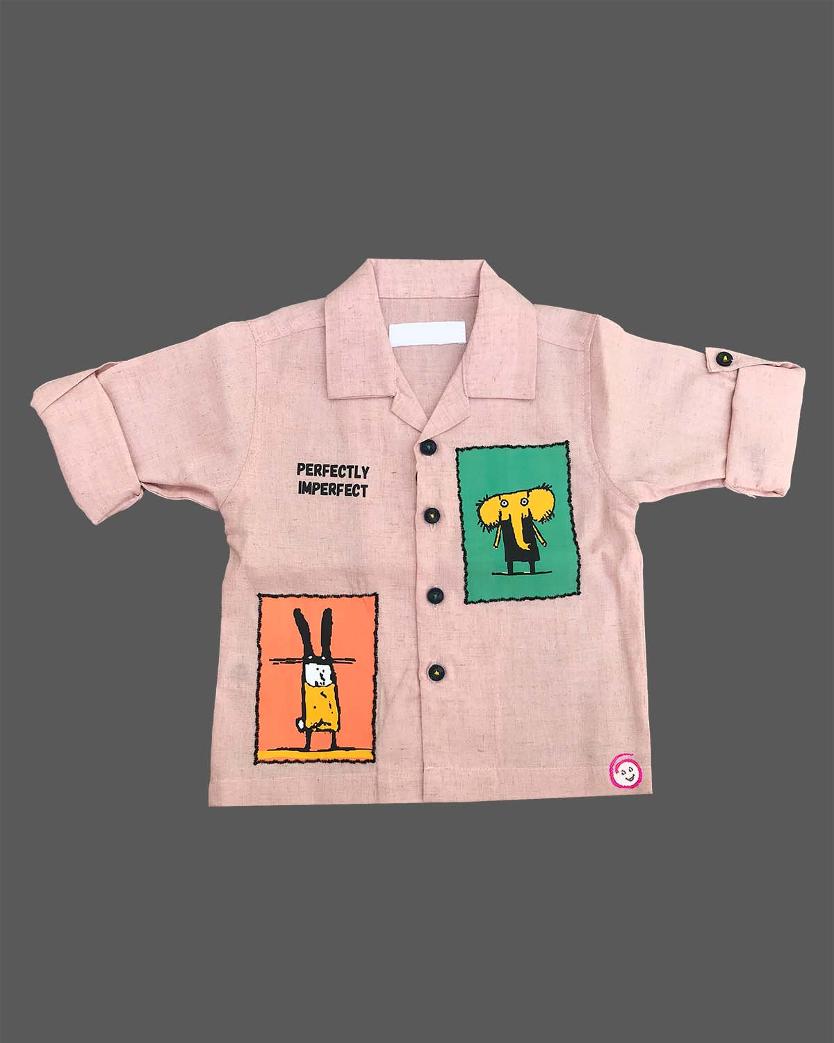 Boys graphic printed button down shirt with roll up sleeves paired with matching cargo pants