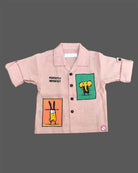 Boys graphic printed button down shirt with roll up sleeves paired with matching cargo pants