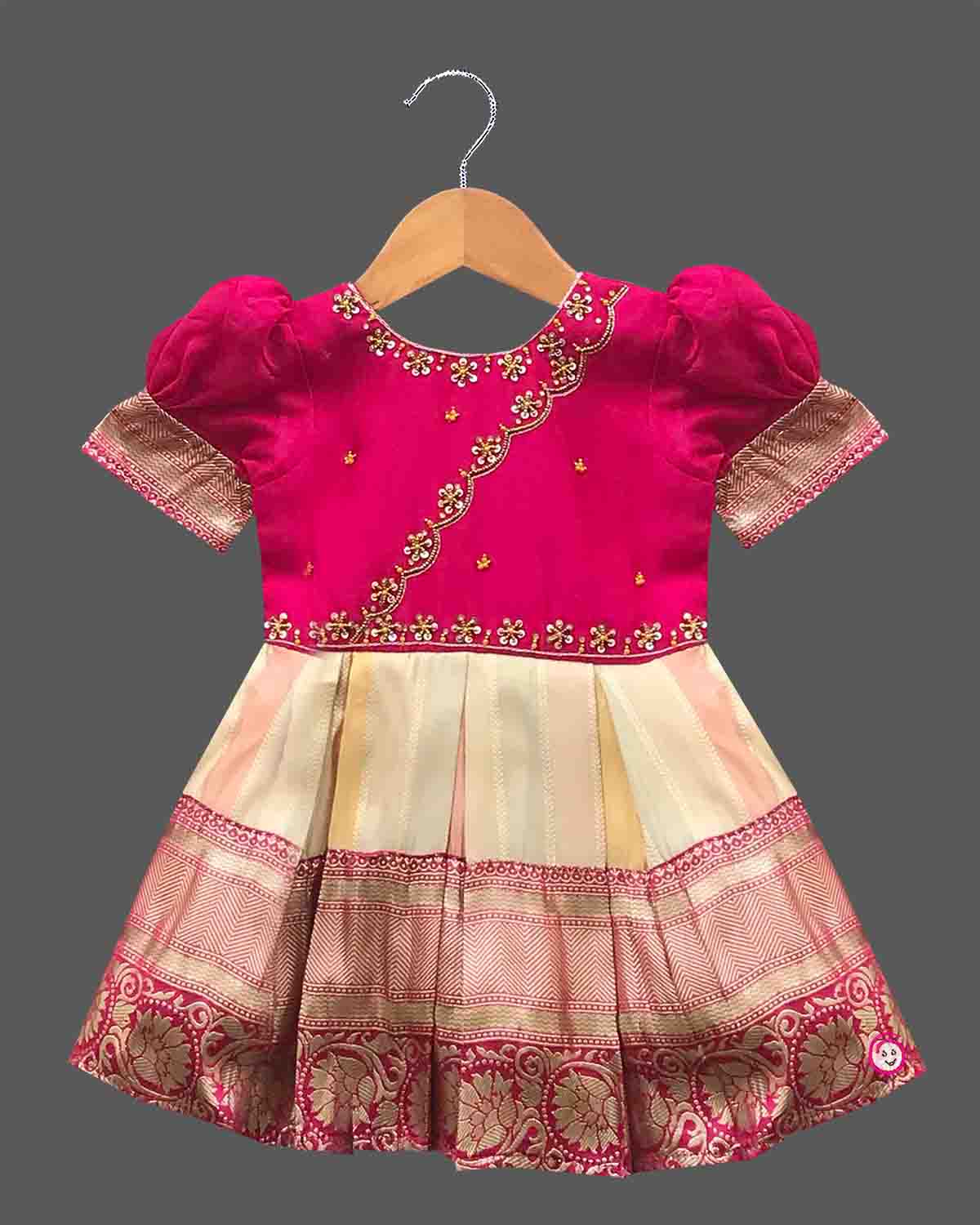 Toddler silk traditional frock with intricate embroidery and zari border for ethnic festivals