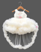 Embellished asymmetrical tulle silk frocks for baby girl featuring ruffled high-low hem.
