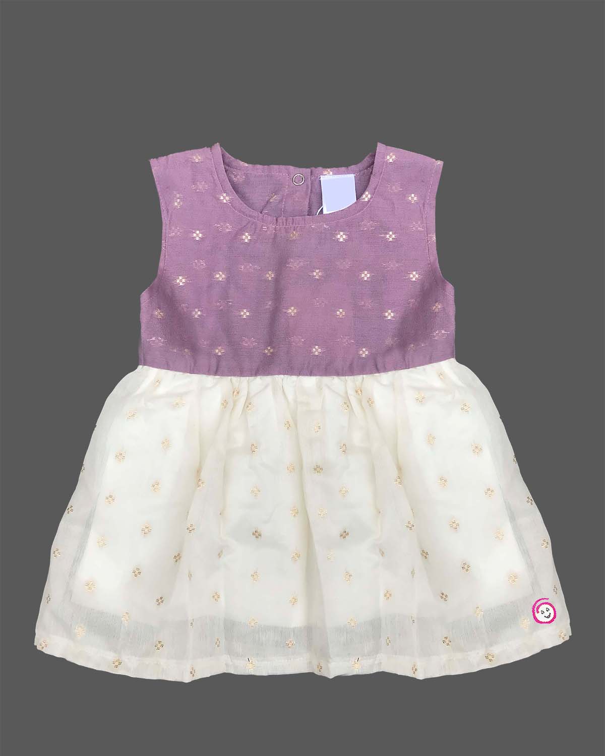 Sleeveless traditional attire for toddlers with small metallic woven patterns and a soft gathered waistline.