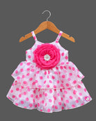 Infant organza casual  frock featuring an oversized rosette accent and tiered layers