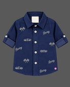 Boys collared button-down shirt and pant set serving as an indo western dress for boys with embroidered motifs.
