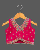 Embroidered V-neck lehenga choli for kids set featuring intricate threadwork, pleated skirt, and sheer dupatta