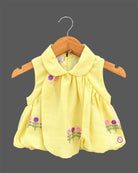 Sleeveless peter pan collar bubble top with floral embroidery paired with matching straight pant