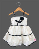 Baby Girl Tiered Frock with flower applique and zig-zag trim detailing for birthday Western wear .