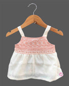 Baby girl embroidered cotton top and pant set featuring shoulder straps and matching wide leg pants for festive occasions