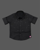 Front view of a designer collared party shirt for boys featuring intricate stud detailing across the yoke and roll-up sleeves.