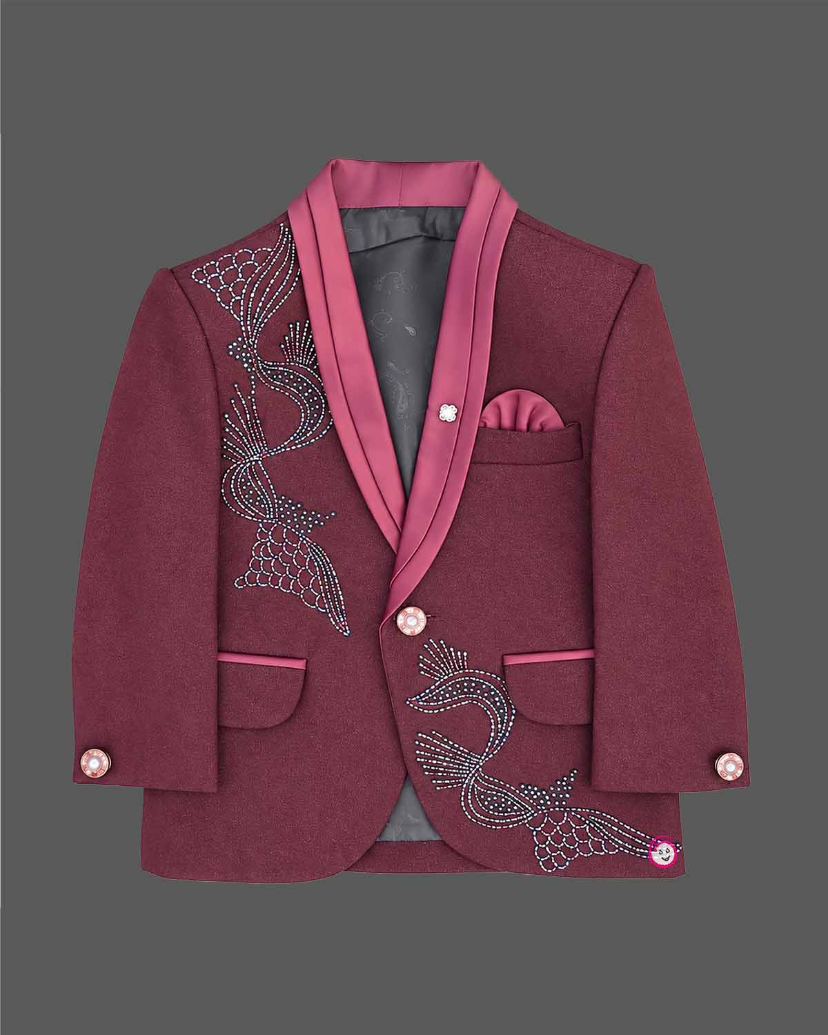Maroon formal suit for little boys featuring a blazer with black and silver sequin details, a grey collar accent, white shirt, black tie, and matching maroon pant against a grey background.