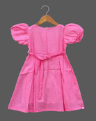 Pink floral cotton dress with puff sleeves for young girls casual wear