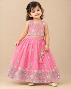 Floral embroidered lehenga choli for kids featuring flared skirt and net dupatta