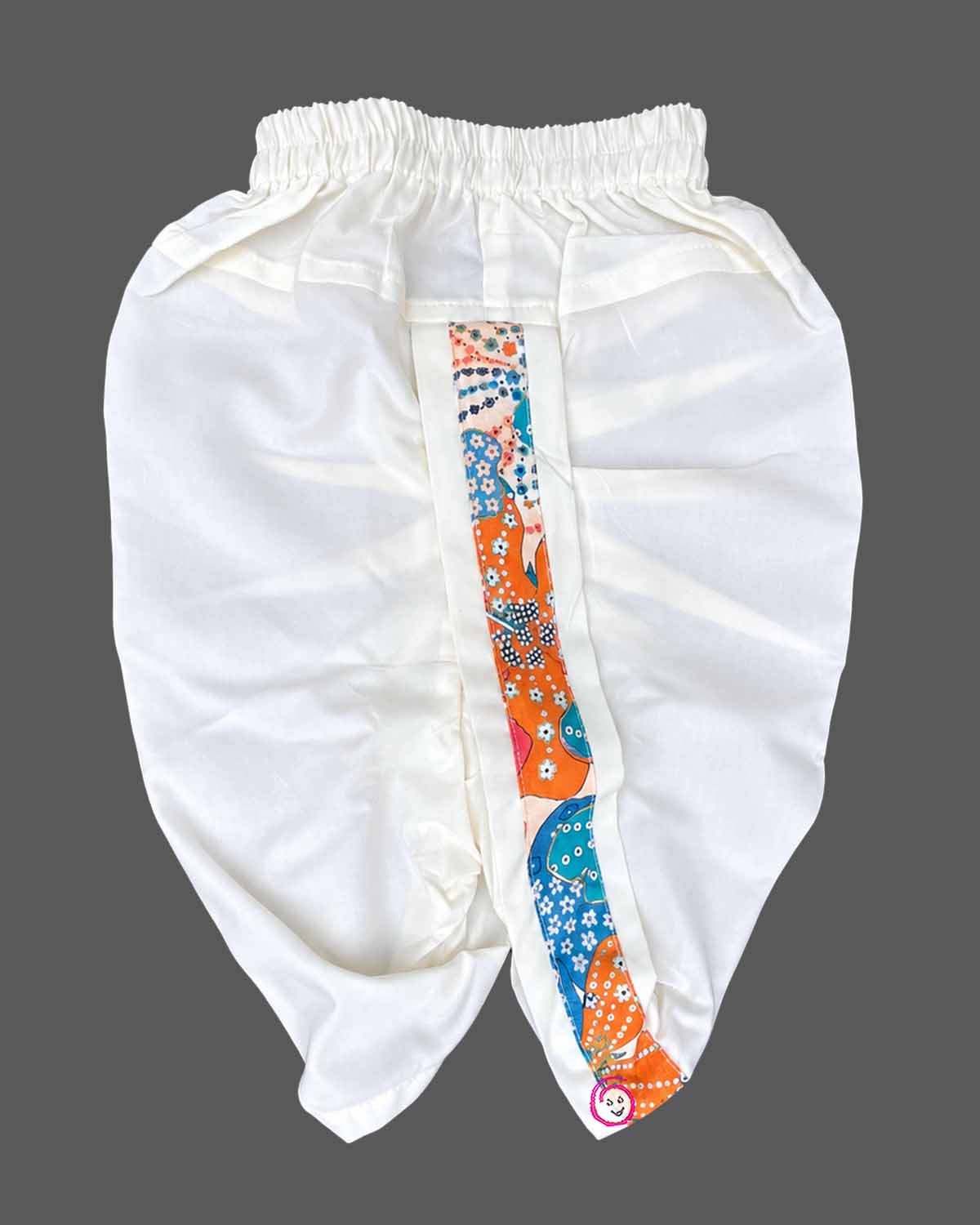 Toddler wearing an asymmetric floral print kids dhoti kurta with mandarin collar and pleated bottoms.