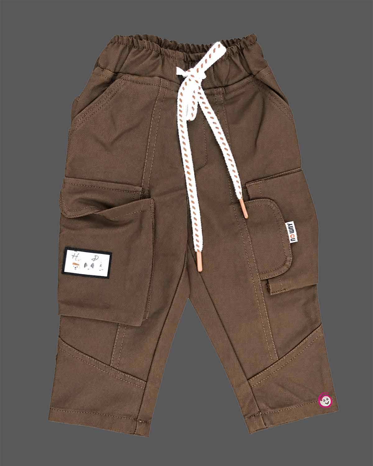 Casual utility cargo pant for young prince designed with dual flap pockets, graphic patch accent, and a thick rope drawstring waistband.