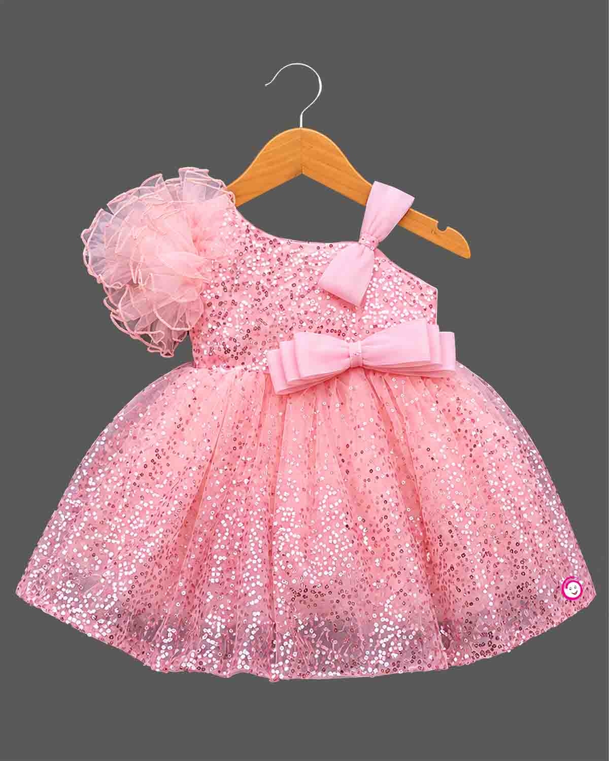 Girls sequin mesh one shoulder party frock with ruffled shoulder and waist bow detail