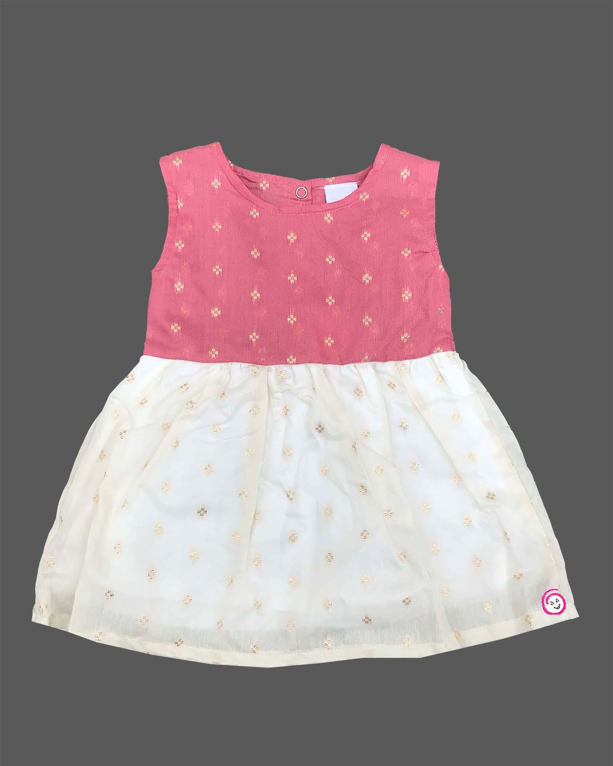 Traditional sleeveless festive attire for a little princess featuring subtle metallic buttis and a gathered flared skirt.