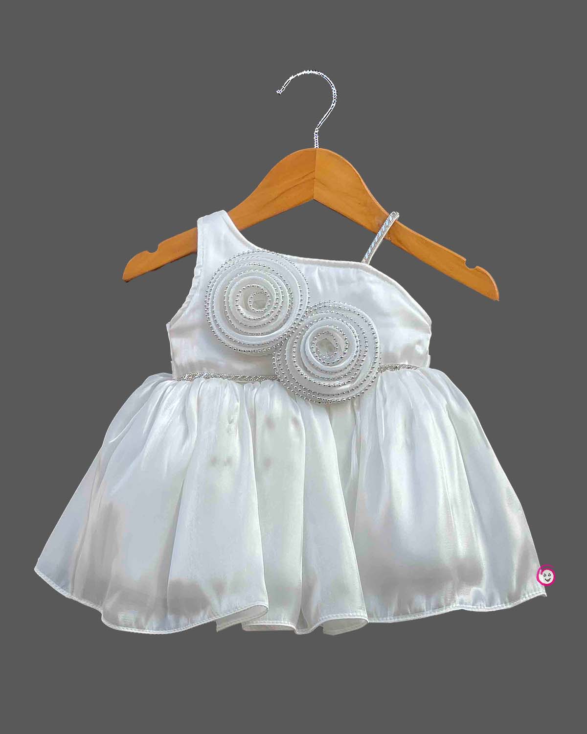 One shoulder baby party wear dress with embellished rosette bodice motif and flared organza skirt.