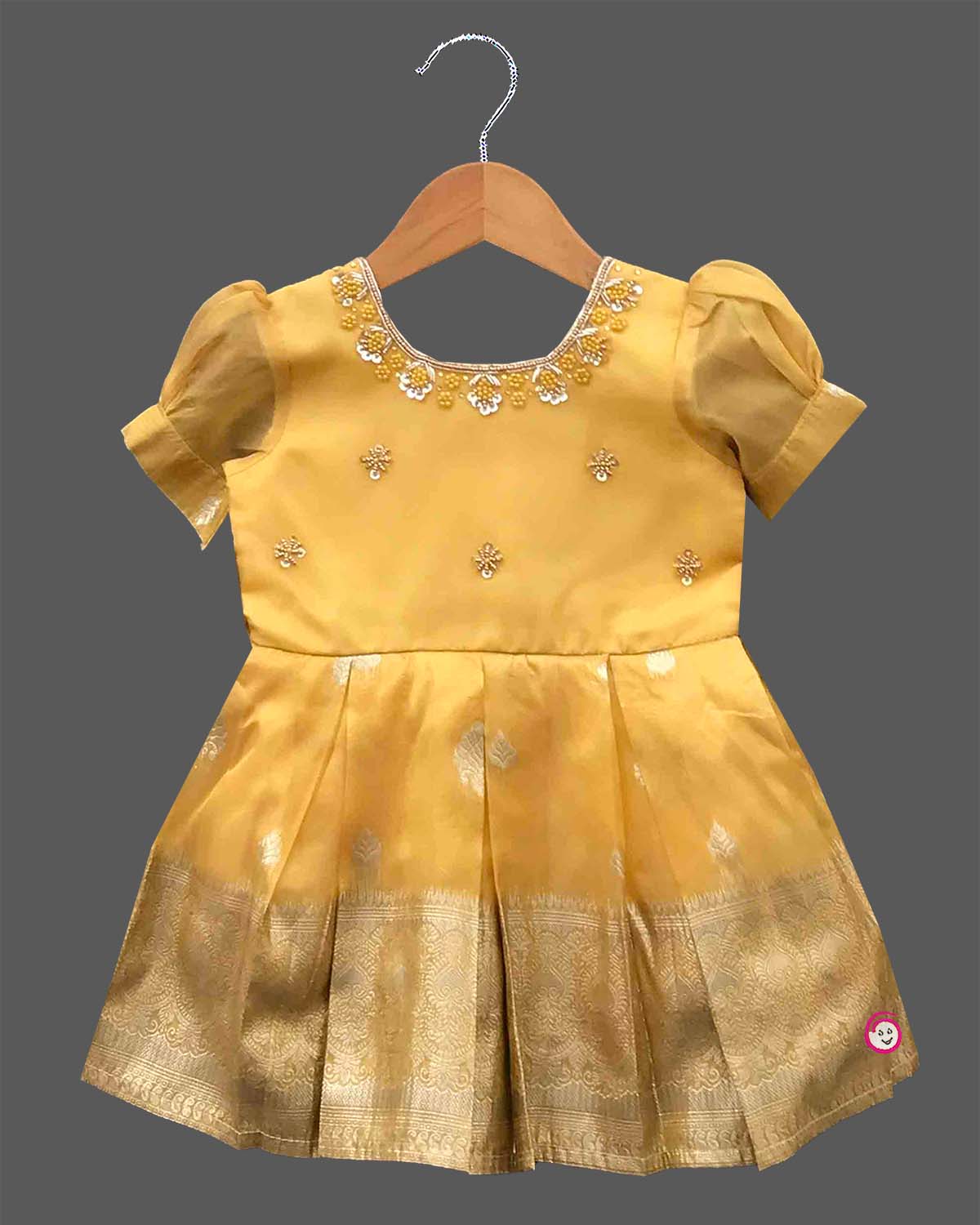 Toddler yellow cotton silk frock with border for festive wear