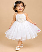 Flared netting baby party wear dress with oversized bodice rosette, matching bow headband, and soft booties.