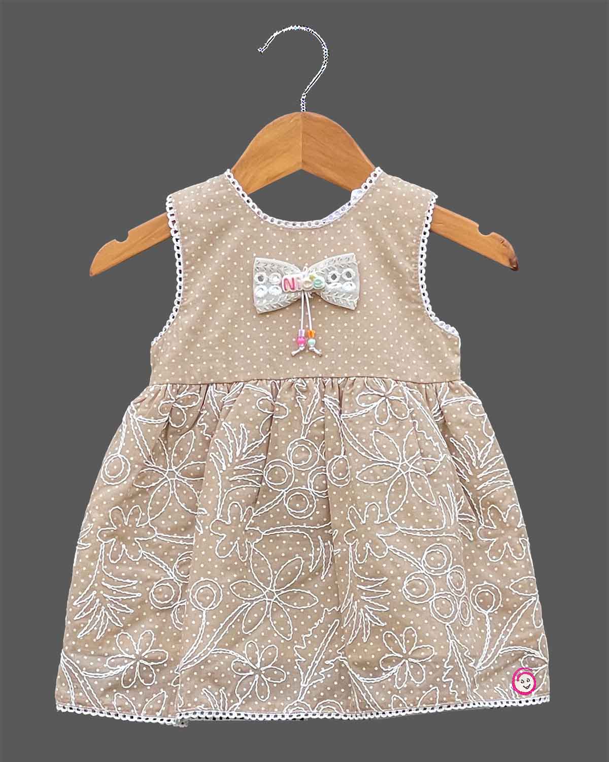 Toddler girl sleeveless embroidered cotton frock with bow detail for casual playdates
