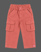 Toddler checked shirt with roll-up sleeves paired with utility cargo trousers for party wear for boys.