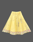 Girls sleeveless embroidered choli with square neck and flared ghagra skirt featuring tassel accents