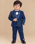 Boys paisley beaded tuxedo suit set with satin shawl collar blazer, waistcoat, bowtie, and dress pant for events.