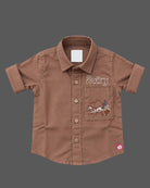 Toddler boys embroidered button-down shirt with front pocket detail for birthday party celebrations.