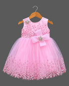 Girls sleeveless tulle party frock with sequined bodice embroidery, pearl flower applique bow, and flared net skirt