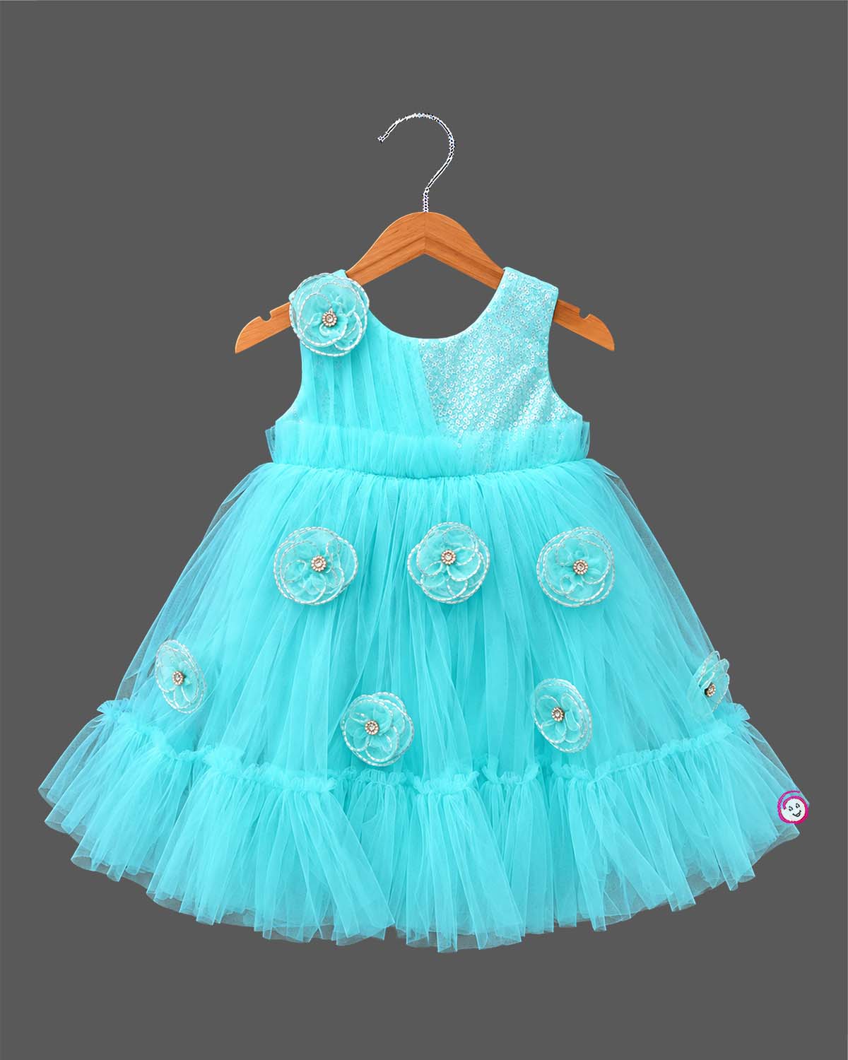 Infant net frock with sequined bodice and floral applique embellishments for kids party wear