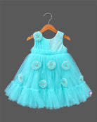 Infant net frock with sequined bodice and floral applique embellishments for kids party wear