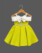 Off-shoulder bow design silk frocks for baby girl with box pleats and pearl tassel details.