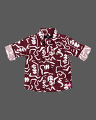 Abstract printed short sleeve shirt and tailored trousers party wear for boys set with elastic waist.