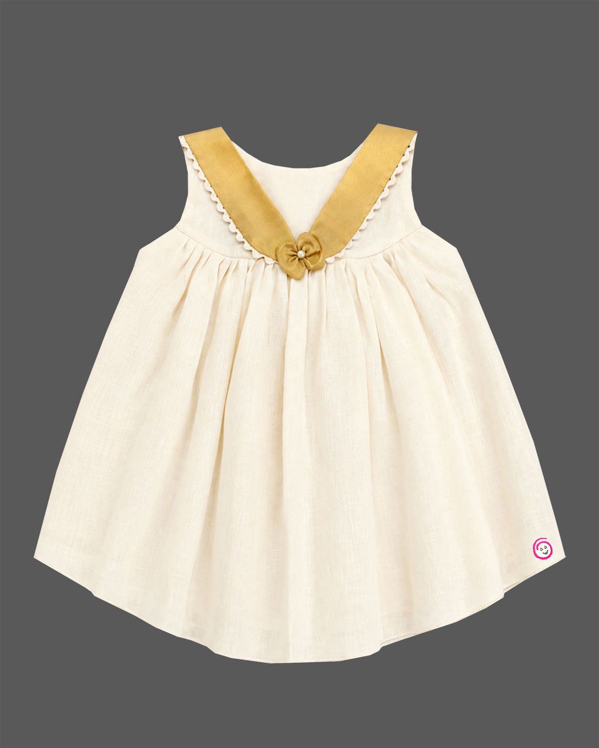 Traditional traditional baby frock for festivals with golden border details and bow accent