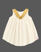 Traditional traditional baby frock for festivals with golden border details and bow accent