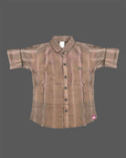 Smart toddler boys button-down casual shirt featuring subtle self-textured stripes and cuffed sleeves.